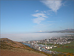 A bank of sea mist over the Town of Peel - (25/4/04)
