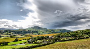 Overlooking Maughold Church and North Barrule Mountain - © Peter Killey